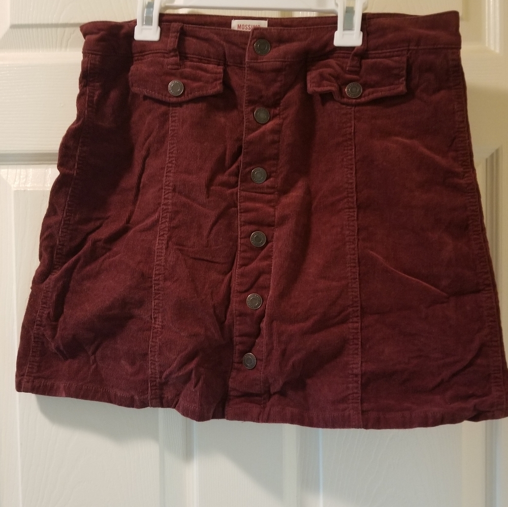 Burgundy skirt , snaps in front